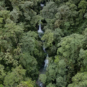 Waterfall inside a rainforest located in a transition between Choco and cloud forest