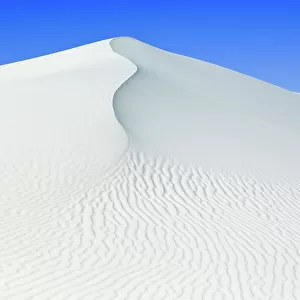 White sand dunes against blue sky, White Sands National Monument, New Mexico, USA, February 2009