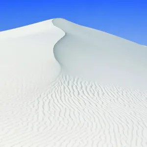 White sand dunes against blue sky, White Sands National Monument, New Mexico, USA, February 2009 White sand dunes against blue sky, White Sands National Monument, New Mexico, USA, February 2009