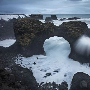 Winter storm on the coast near Arnastapi (rock arch of Gatklettur), Snaefellsness Peninsula