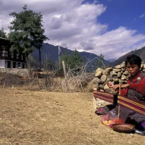 Woman weaving, Paro valley, Central Bhutan Woman weaving, Paro valley, Central Bhutan