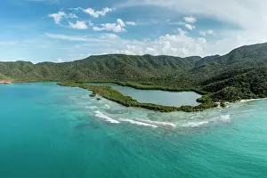 Colombia Prints: Aerial view of coastline and mangrove wetlands along Chengue Bay Tayrona National Park