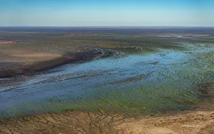 South Australia Prints: Aerial view of desert and river