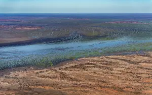 South Australia Prints: Aerial view of desert and river