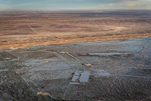 South Australia Prints: Aerial view of flooded mining infrastructure in the Lake Eyre basin