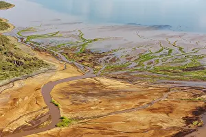 Lake Magadi Prints: Aerial view of freshwater estuary entering the lake after heavy rains