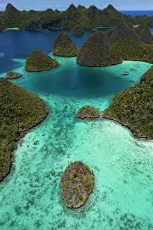 Islands Prints: Aerial view of islands in the Wayag Archipelago