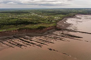 Elevated View Prints: Aerial view of the Joggins Fossil Cliffs UNESCO World Heritage Site along the shore