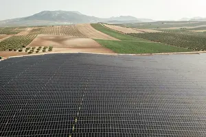 Environmental Issues Prints: Aerial view of large solar power farm, Granada district, southern Spain. June, 2023