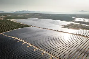 Environmental Issues Prints: Aerial view of large solar power farm, Granada district, southern Spain. June, 2023