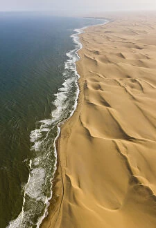 Arid Gallery: Aerial view of the Long Wall, sand dunes along the Atlantic coast of the Namib
