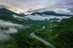 Verdant Prints: Aerial view of low morning clouds over mountains surrounding the Namosi River