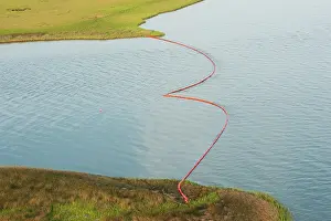 Industry Prints: Aerial view of oil containment boom