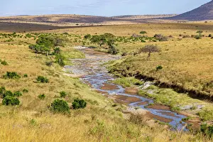 Savanna Prints: Aerial view of the plains and the Sand river, Masai-Mara game reserve, Kenya. August, 2023