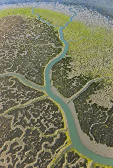 Aerial view river tributaries and saltmarshes of Bahia de Cadiz Natural Park, Huelva
