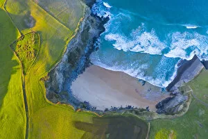 Aerial view of the sea Antuerta beach, Trasmiera Coast. Cantabrian Sea, Cantabria, Spain. January 2020