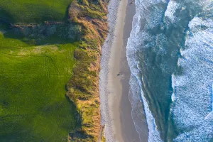 Aerial view of the sea at Oyambre Natural Park, San Vicente de la Barquera, Cantabrian Sea, Cantabria, Spain Aerial view of the sea at Oyambre Natural Park, San Vicente de la Barquera, Cantabrian Sea, Cantabria, Spain