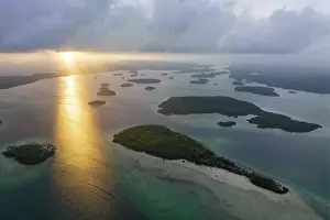 Islands Prints: Aerial view of sunset over the Roviana lagoon and dozens of small