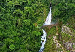 Verdant Prints: Aerial view of waterfall in tropical