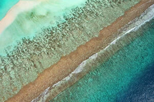Yellow Collection: Aerial view of waves breaking on reef edge and sand bank, along South Ari Atoll, Maldives
