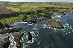 Aerial view to the west of Portbraddan on the north coast of County Antrim