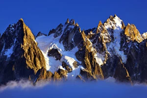 Images Dated 16th September 2008: Aiguilles de Chamonix at sunset with clouds rising, Haute Savoie, France, Europe, September 2008