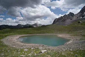 Alpes Gallery: Alpine lake at an altitude of 2400 m, drying up during heatwave in summer, Lac des Rouites