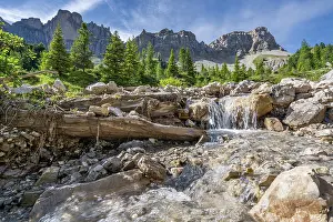 Dolomites Prints: Alpine stream on Adolf Munkel hiking route with Odle/ Geisler mountain group behind