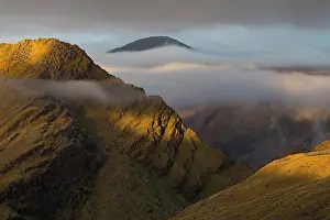 Alpine Prints: The alpine tussock and boulder fields of the Haast Range under low cloud