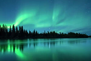 Cool Coloured Coasts Collection: Aurora Borealis (Northern Lights) over the Klondike River, Yukon Territories, Canada, September 2013