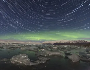 Sci Fi Prints: Aurora borealis and star trails over Jokulsarlon glacier lagoon. Southern Iceland