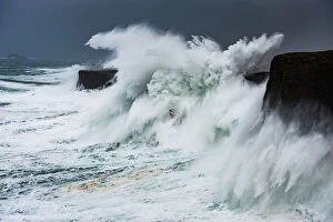 Wave Gallery: Big storm hitting cliffs, with waves breaking over the top, Shetland, Scotland, UK, July