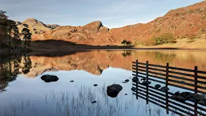 Blea Tarn, evening light and reflections in autumn, Cumbria, The Lake District, UK. November 2016