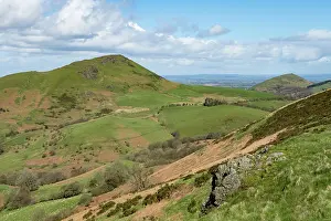 Caer Caradoc Hill and The Lawley composed of volcanic rock from the Precambrian Period viewed from Hope Bowdler Hill, Shropshire Hills National Landscape, England, UK. March, 2024