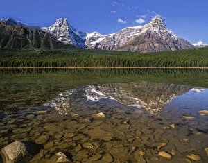 Canadian Rockies reflected in lake, Banff National Park, Alberta, Canada
