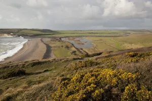 Chalk downland and river estuary. Seven Sisters Country Park, South Downs, England