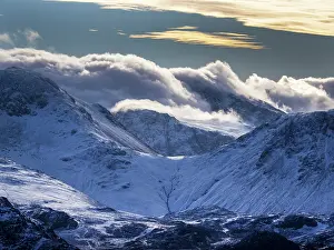 Lake District Prints: Cloud spilling over snow covered Great Gable and the Sca Fell from Hindscarth