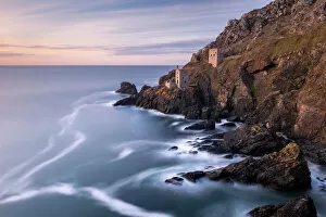 The Crowns Engine Houses at Botallack, high tide at sunset, West Cornwall, UK