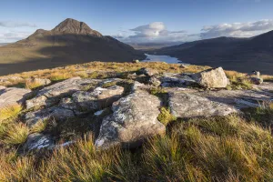 Cul Beag mountain and loch in evening light from Stac Pollaidh, Coigach, Scotland, UK. September, 2017