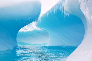 Curves on edge of iceberg in Southern Ocean. One of the most rapidly warming areas on the
