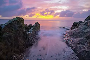 Devon Prints: Dawn light and calm conditions looking out sea from beach at Tor cross
