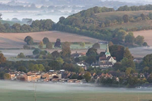 Dawn mist on the fields around the village of South Harting. South Downs, Sussex