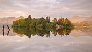 Images Dated 9th July 2020: Derwentwater, posts and boathouse, early morning reflections