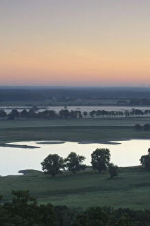 Elbe River at sunrise with mist over fields, Elbe Biosphere Reserve, Lower Saxony