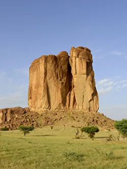 Sandstone Prints: Eroded sandstone rock formation standing out in plateau in the Sahara desert