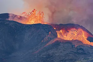 Fagradalsfjall Volcano erupting with lava overflowing to lava fields