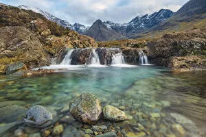 Rock Gallery: Fairy Pools with Black Cuillin mountains in background, Isle of Skye, Inner Hebrides, Scotland, UK
