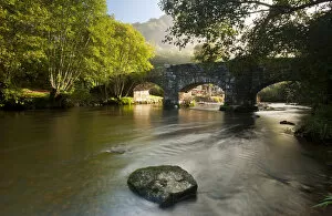 Fingle Bridge, a historic stone bridge possibly dating from the seventeenth century