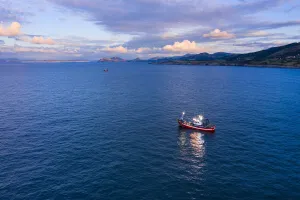 Fishing boat fishing in the Cantabrian Sea between Cerdigo and Castro Urdiales Fishing boat fishing in the Cantabrian Sea between Cerdigo and Castro Urdiales