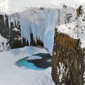 Frozen waterfall in Putoransky State Nature Reserve, Putorana Plateau, Siberia, Russia